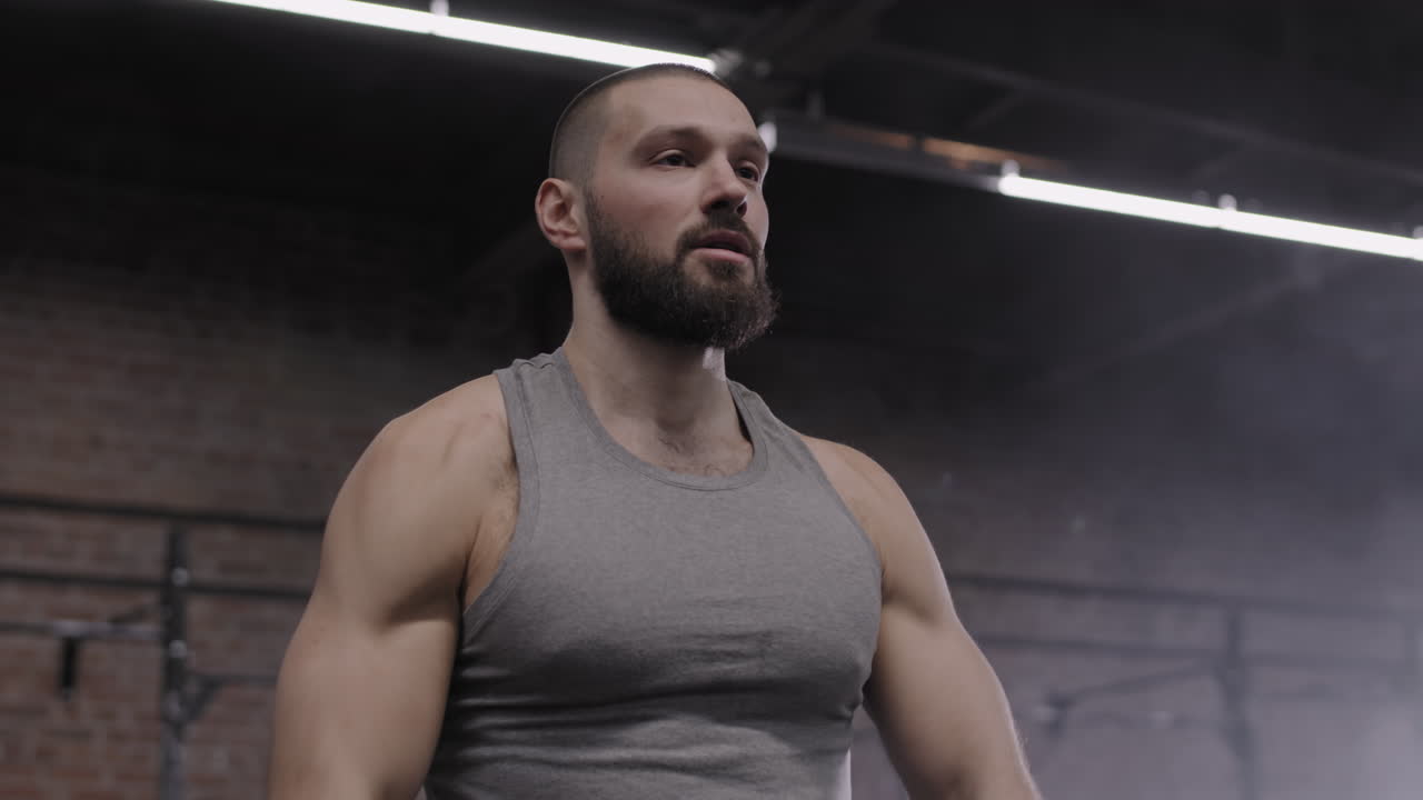 Sportsman Having Intensive Training in Gym