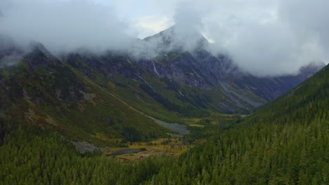 beautiful green mountain valley landscape of british colombia, canada -aerial