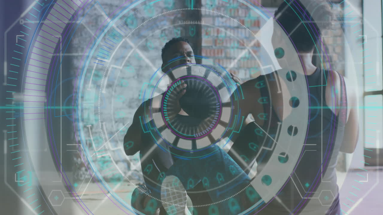 fitness trainer coaching trainee in loft studio, hud graphic overlay circling medicine ball lift