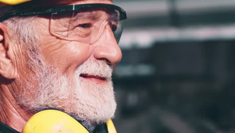 Senior-factory-worker-or-engineer-close-up-portrait-in-factory