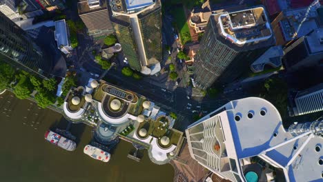 Top-down-View-Of-Light-Traffic-At-Charlotte-Street-Along-With-Eagle-Street-Pier-Ferry-Terminal-In-Brisbane-City---Australia