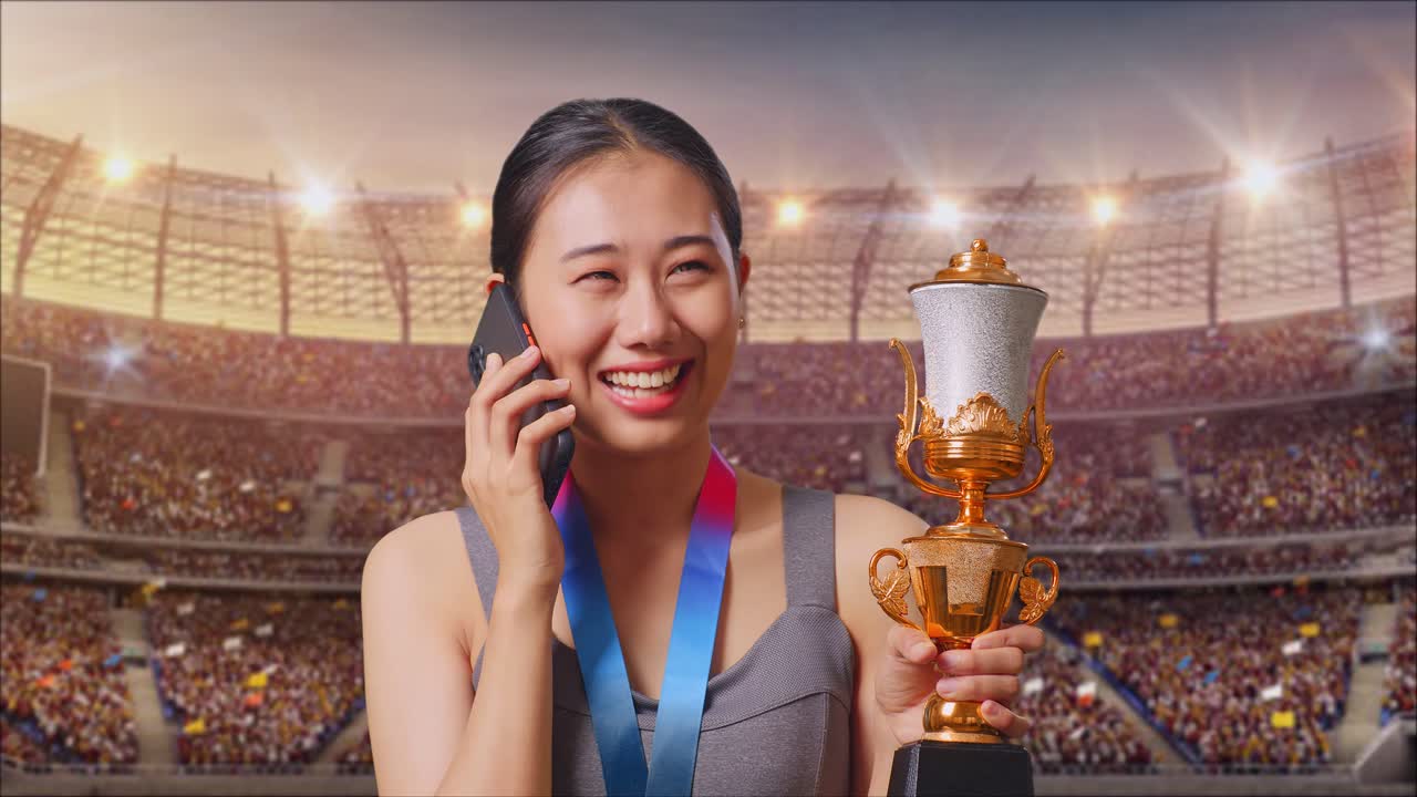 Woman Celebrating Victory with Trophy in Stadium