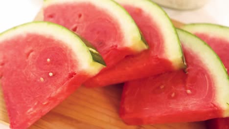 View-of-slices-of-watermelon-on-a-wooden-board