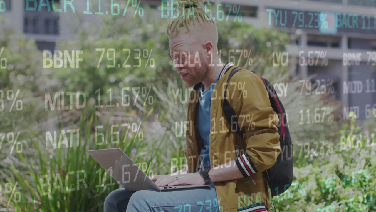 Animation of stock market data moving over african american man with albino using laptop
