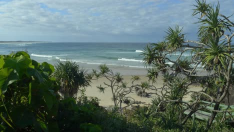 ocean waves and cloudy sky in cabarita, new south wales, australia - wide shot