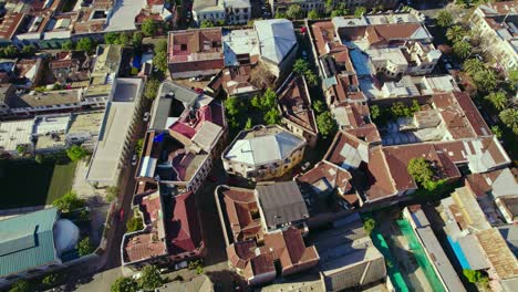 Panoramic-aerial-view-establishing-the-design-of-the-streets-of-the-Concha-y-Toro-neighborhood,-rusty-zinc-roofs