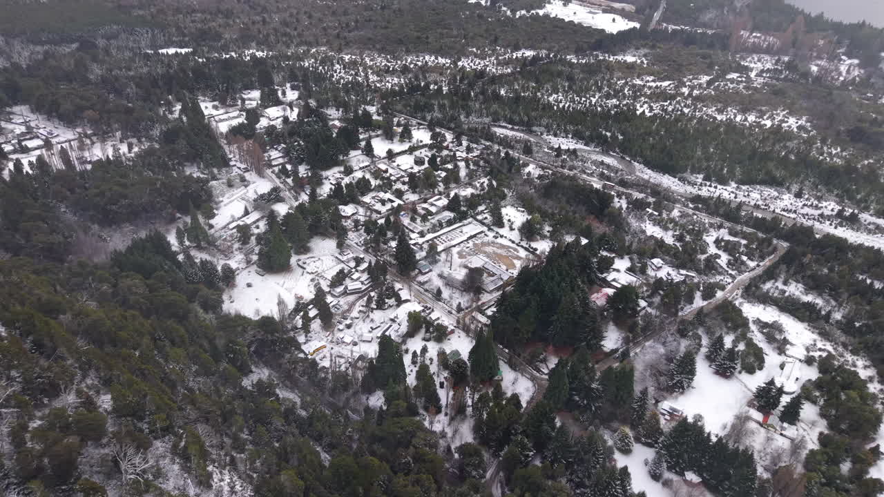 Colonia Suiza in Bariloche, Argentina, is covered in snow, surrounded by mountains and winter stillness
