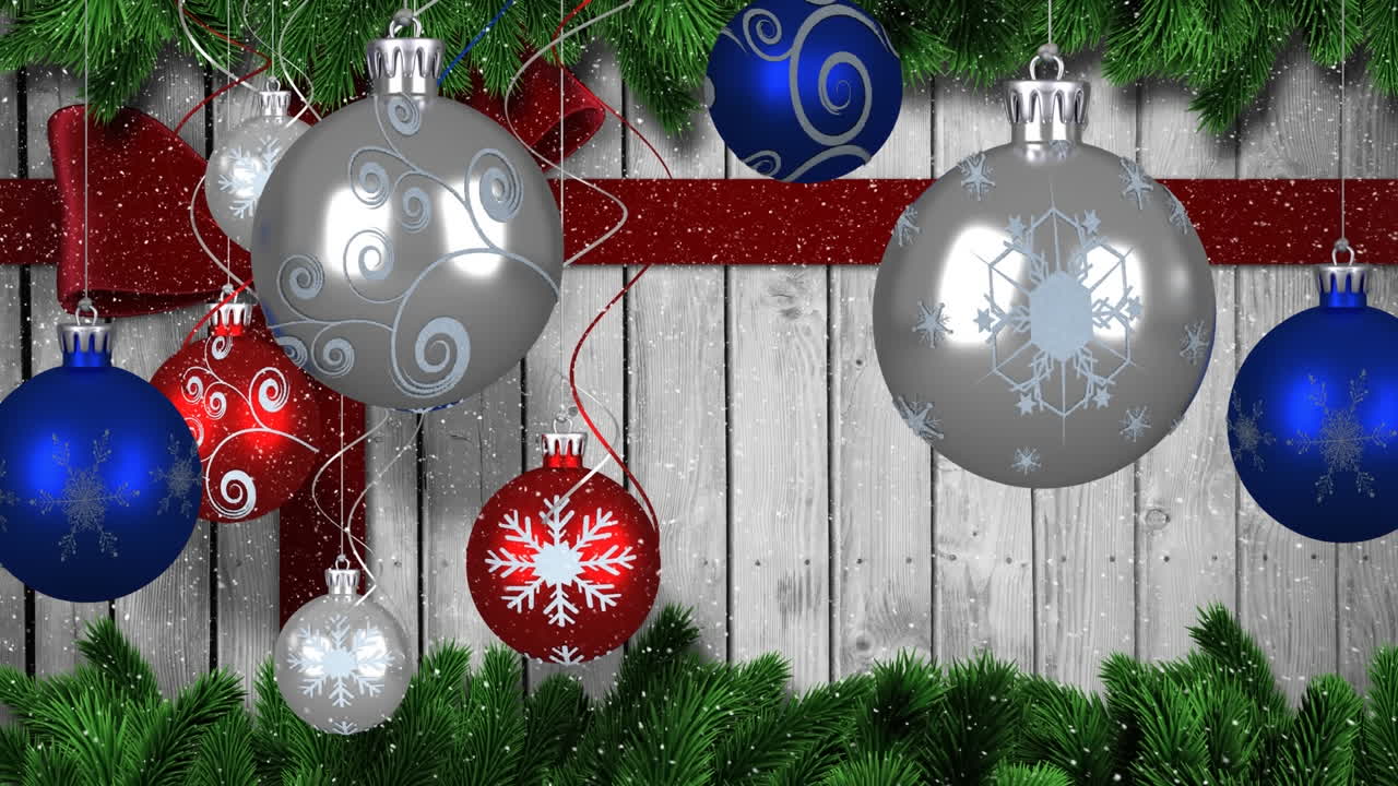 animación de la nieve cayendo sobre las decoraciones de las bolas de navidad