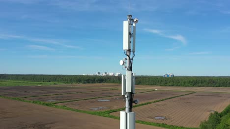 cellular gsm tower with 3g, 5g transmitter. communication antenna. future technology. aerial view from drone