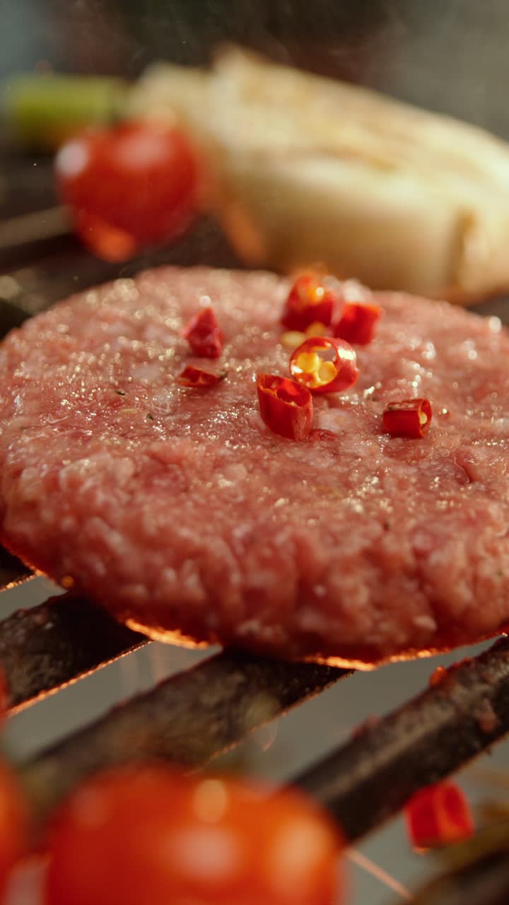 Burger with Tomatoes and Red Pepper on the Grill