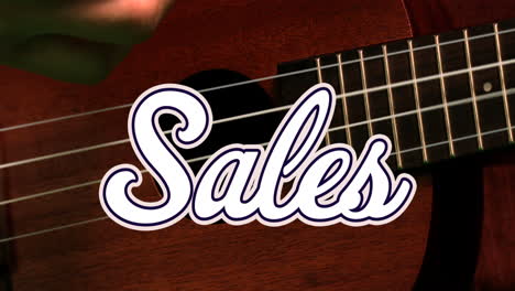 animación de un cartel de texto de ventas contra un primer plano de una mano tocando una guitarra