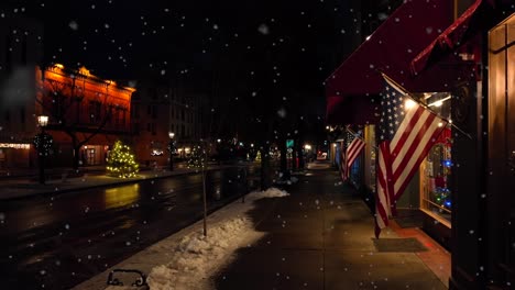 snow falling outside of small town store in america