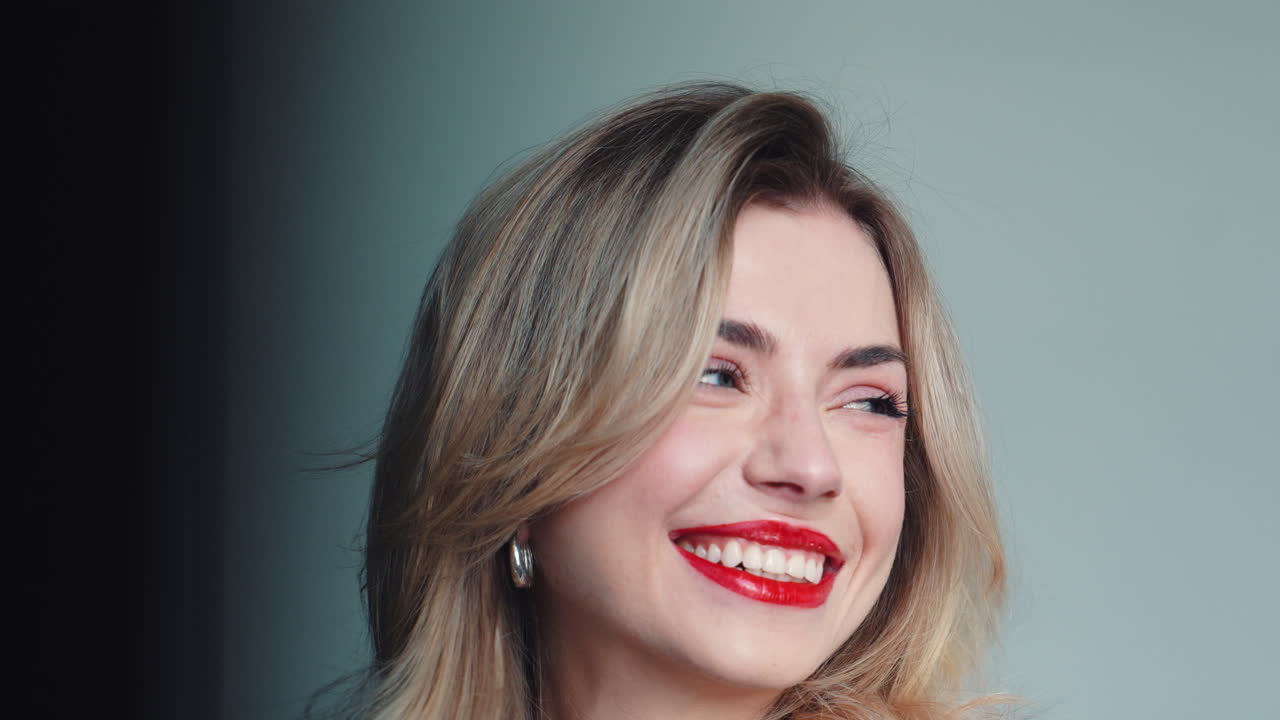 Woman Portrait with Red Lipstick and Nails