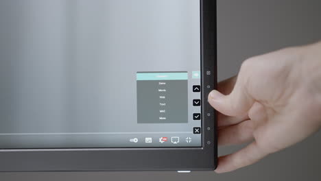 adjusting display settings on a monitor
