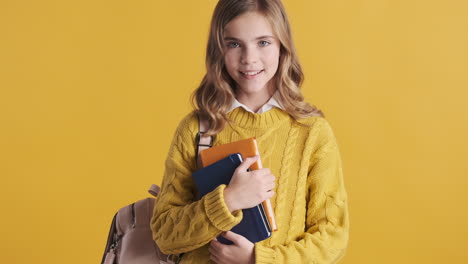 teenage caucasian girl student wearing backpack.