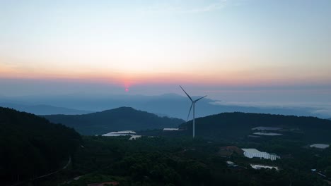 wind power turbines on high hills in vietnam at sunrise - wind power