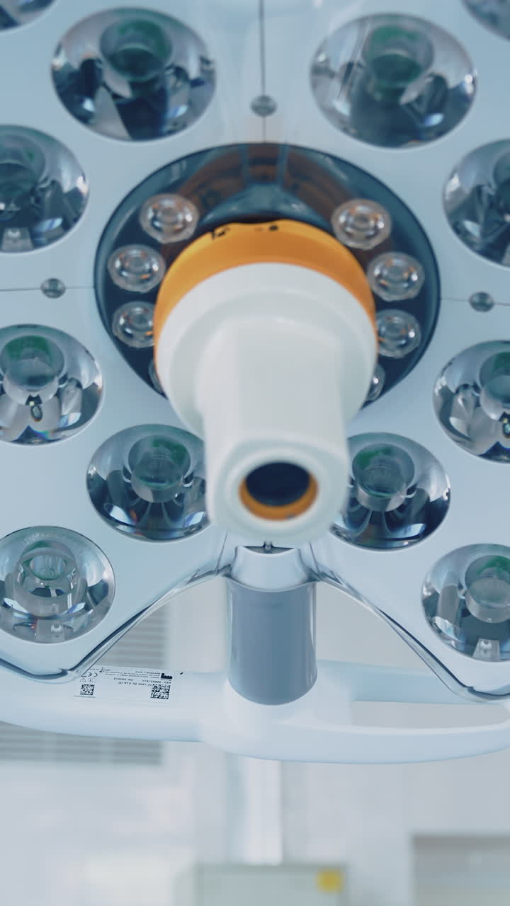 Surgery lights. Medical light equipment in the operating room. Modern medical lamp in clinic. Vertical video