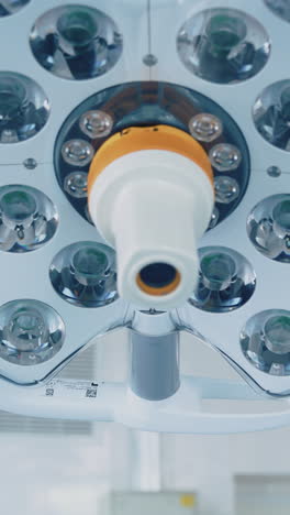 surgery lights. medical light equipment in the operating room. modern medical lamp in clinic. vertical video