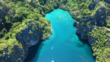 cinematic aerial of big lagoon, small lagoon, el nido, palawan, philippines