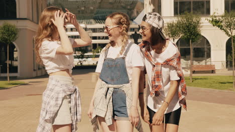 three happy friends enjoying the sunny day