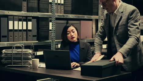 team members investigating authenticity of historical documents