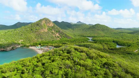 panoramic aerial dolly to santa cruze beach with christoffelberg and hills of westpunt curacao