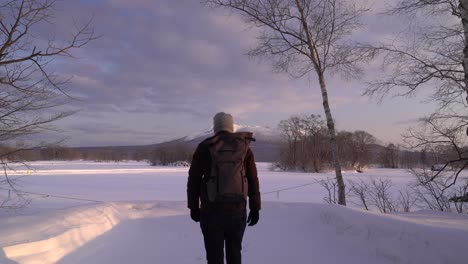 Male-hiker-walking-up-towards-viewpoint-at-Onuma-Koen-in-Japan