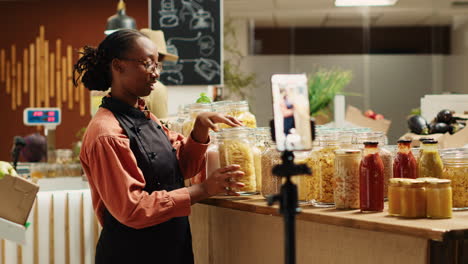 merchant creating promotional video in local farmers market