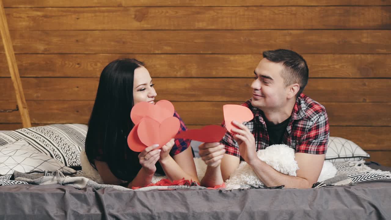 Happy smiling couple in love. Positive and carefree couple having fun