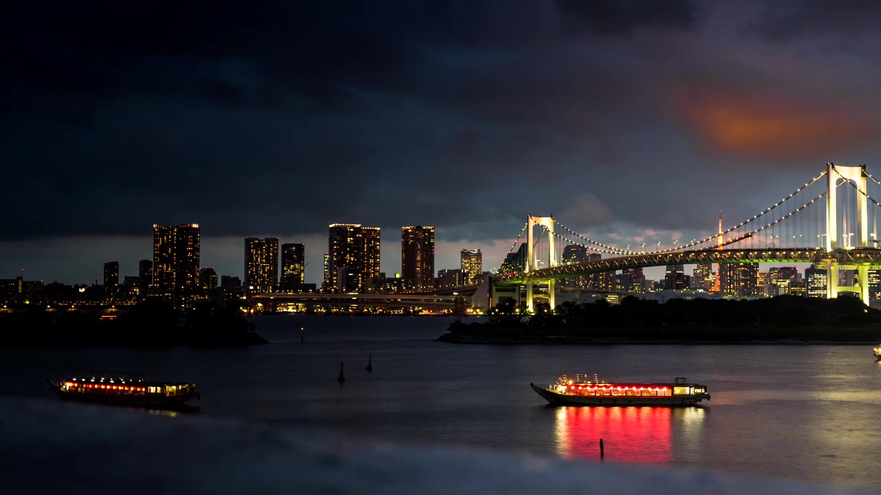 Timelapse dello skyline di Tokyo con il Rainbow Bridge