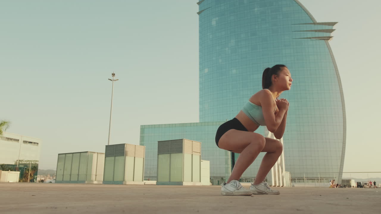 Woman exercising outdoors in sportswear