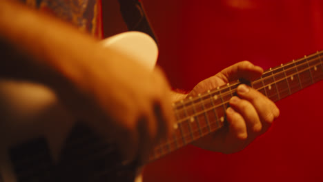 Close-up-of-fingers-playing-electric-guitar-5