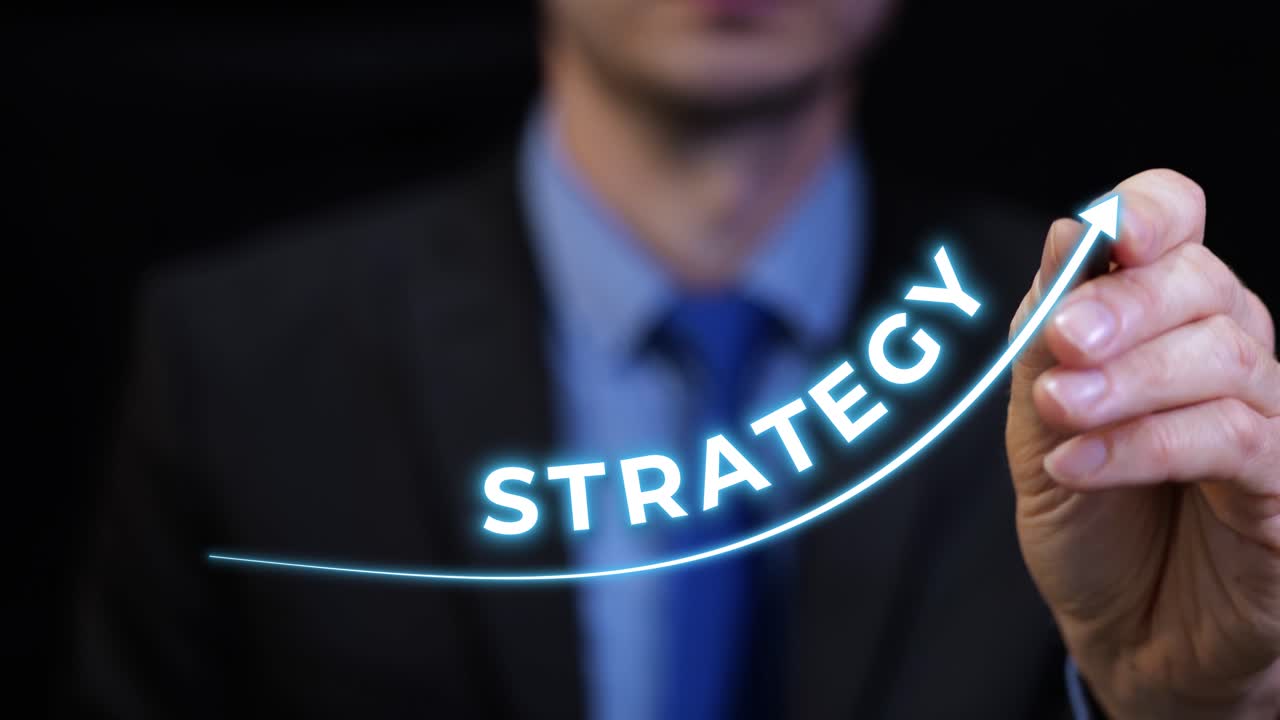 Man drawing rising business chart about strategy. Concept for team success