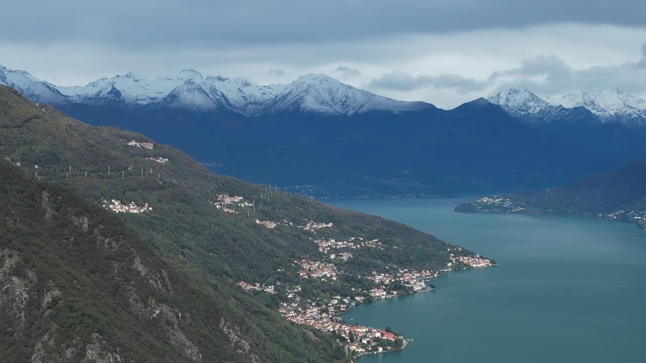 Beautiful aerial view of the Alps landscape in Italy with a serene lake