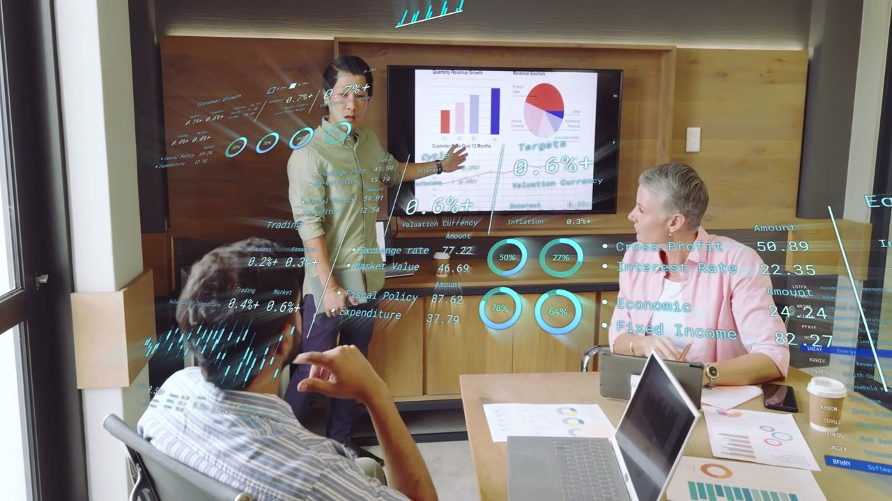 Presenter walking to screen pointing bar or pie charts data overlay appearing noting data for busine