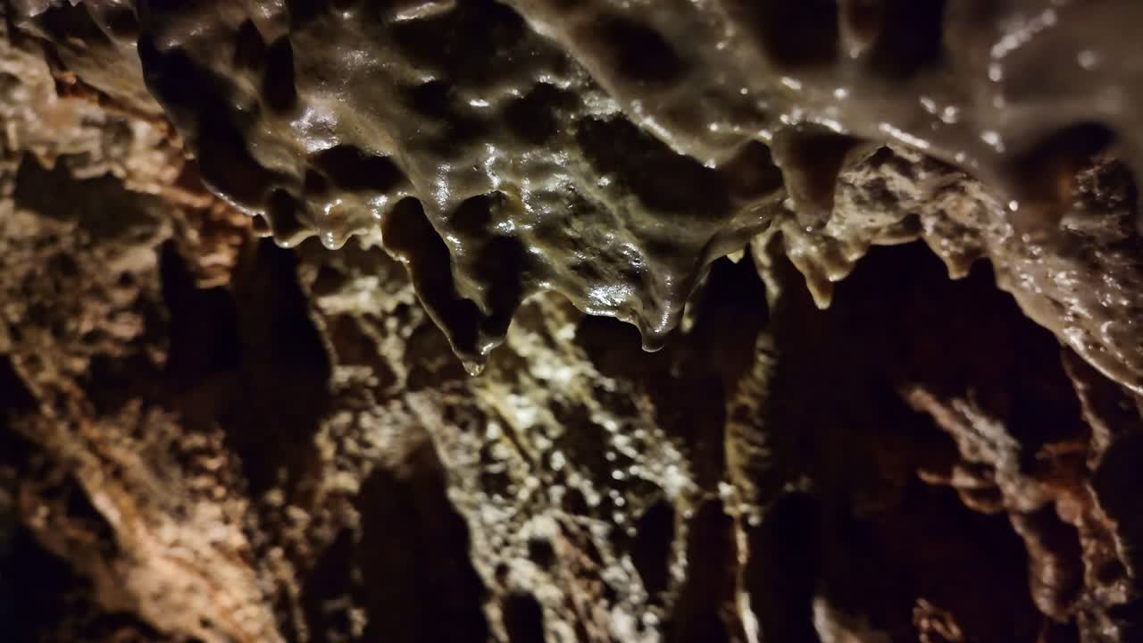 Close-up view of stalactites formations inside the caves of Rochefort, Saint-Pierre-sur-Erve, Mayenne, France