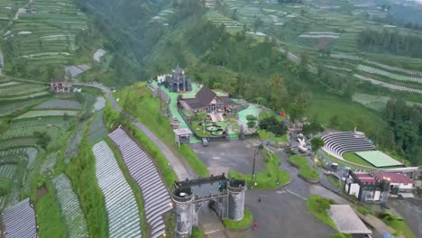 reveal drone shot of outdoor park with beautiful view of huge mountain