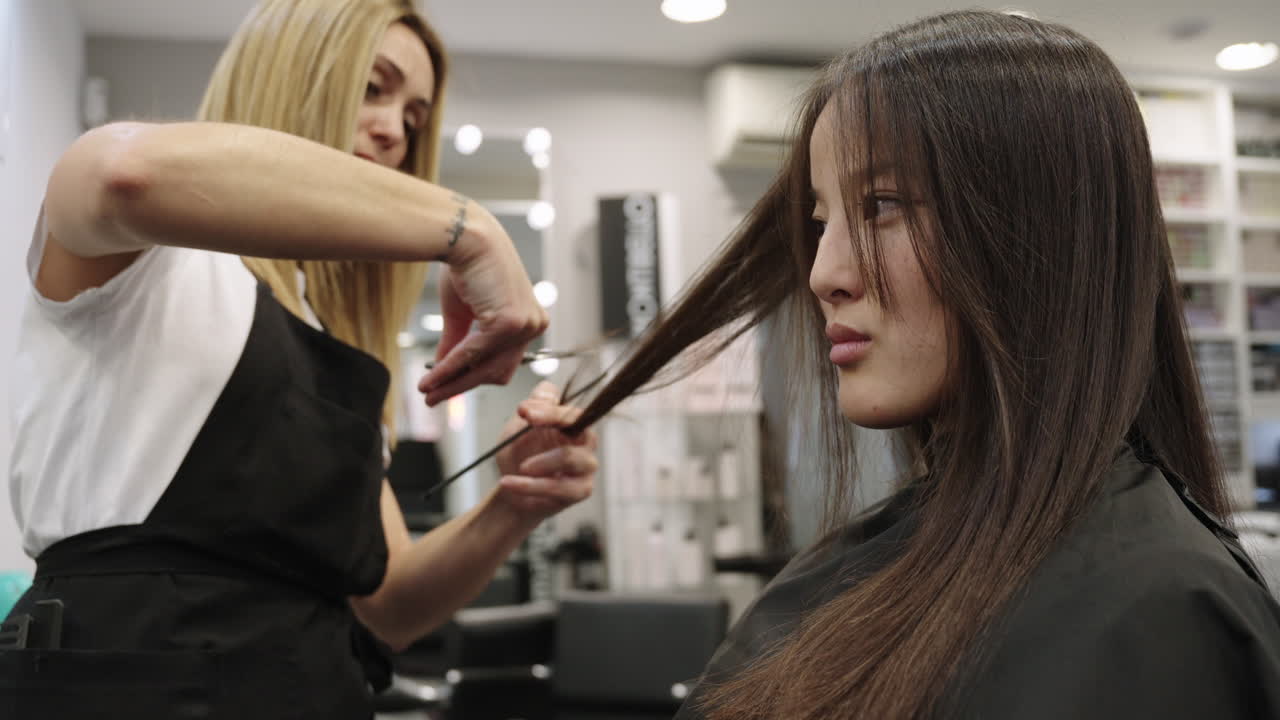 Woman getting a haircut at a hair salon