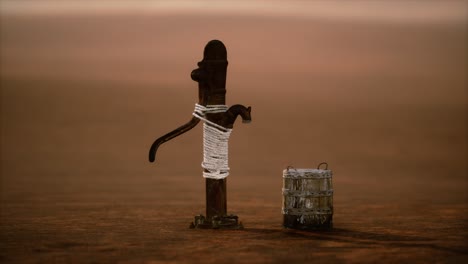 viejo pozo de metal oxidado en el desierto