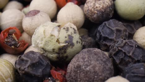 Macro-close-up-Mixed-peppercorns.-Dry-mix-peppercorns-close-up