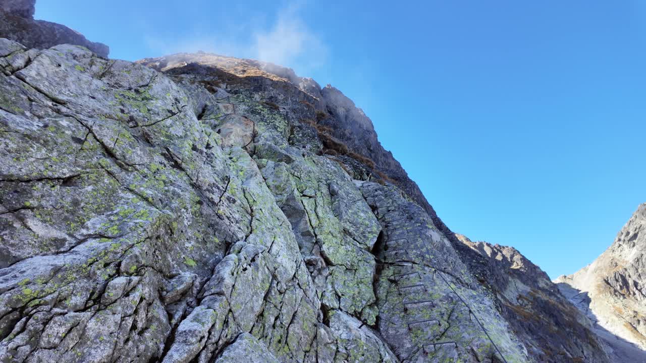 Dangerous trail in the High Tatras, rocky mountains of Slovakia.