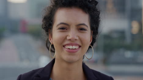 portrait-beautiful-young-hispanic-business-woman-laughing-enjoying-successful-urban-lifestyle-in-city-wearing-stylish-earings-slow-motion