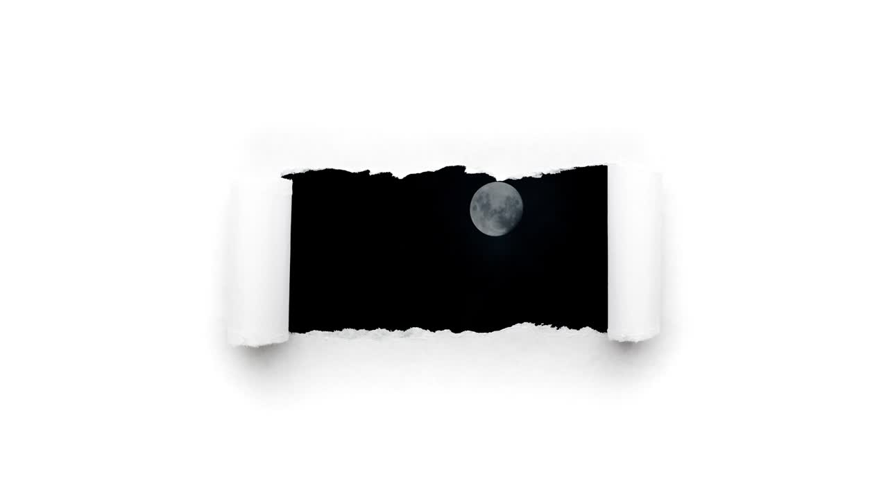 Creative 4k time laps video of a glowing full moon in the night sky with floating clouds, which is visible through a hole with torn edges in white paper.