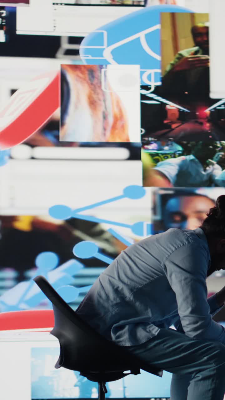 Vertical Video Young man stares at smartphone in distress symbolizing toxic impact