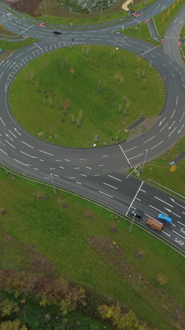 Aerial drone view of new roads and roundabouts at busy highway junction with traffic moving smoothly near Leicester United Kingdom