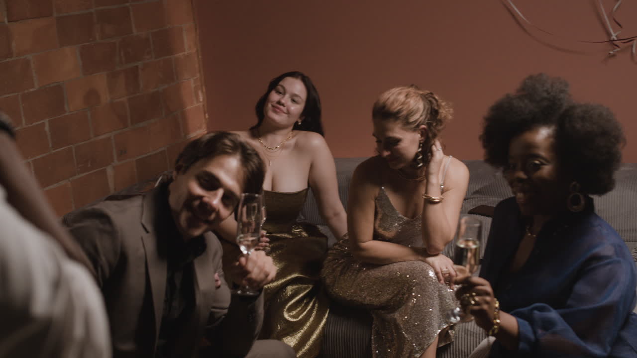 Friends celebrating with champagne at a party