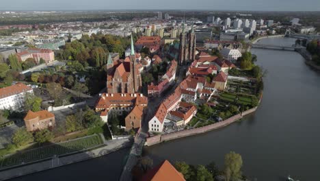 reverse reveal of tumski bridge and church of st mary on sand island wroclaw