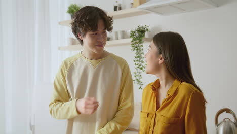young couple cooking together