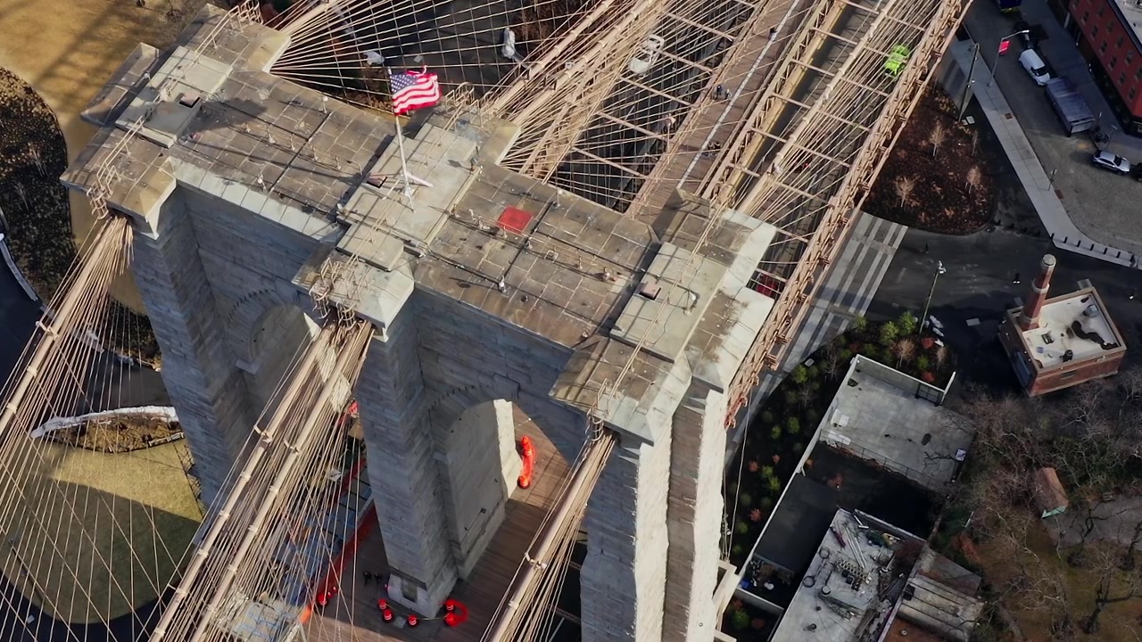 View of Brooklyn Bridge in New York City from above on a sunny day