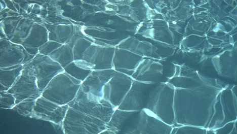 swimming pool reflections in slow motion